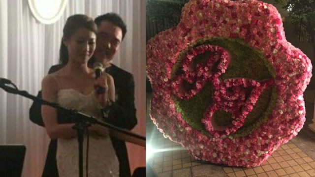 Vòng hoa tươi màu hồng và màu trắng kết thành tên tiếng Anh của cô dâu chú rể “RJ” (Rosina & Jason).
